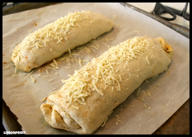 Pizza rolls on baking sheet ready for the oven. 