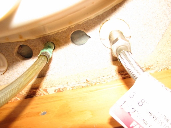 too many holes in counter for faucet