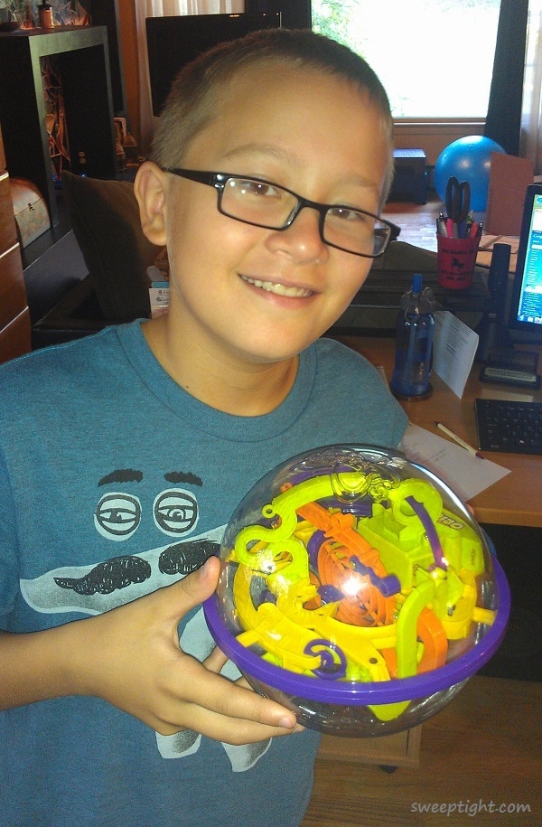 Adam with the Perplexus puzzle game 