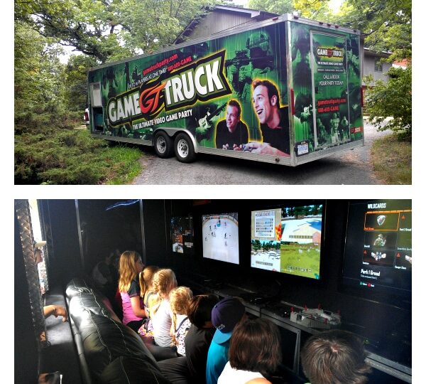 The Game Truck on the driveway and kids inside playing video games. 