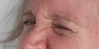 Squinting my eye. 