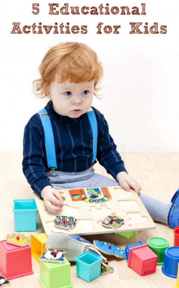 Little kid playing with a toy.