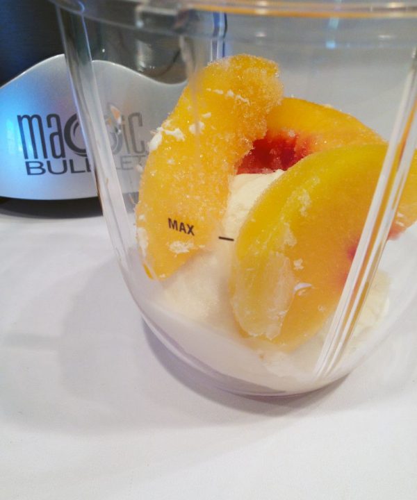 Peach Milkshake in White Chocolate Cup with Peach & Pink Sprinkles