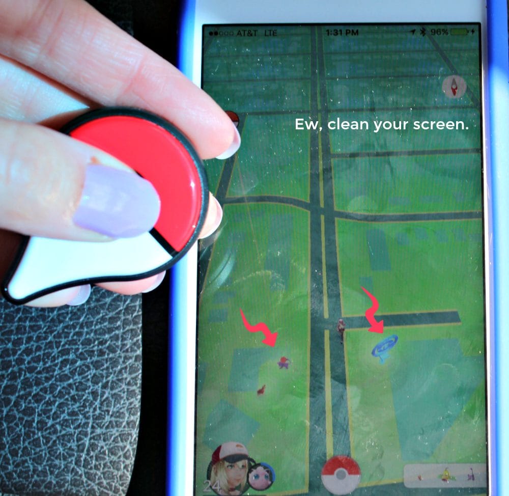 Holding the Pokemon Go plus over my filthy phone screen.