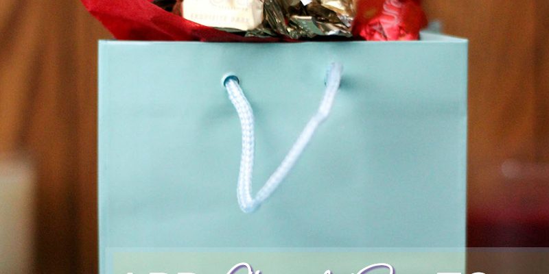Candy on top of a gift bag.