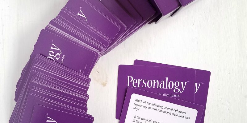 Personalogy cards spread across a table. 