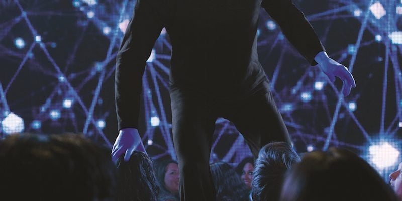 A Blue Man on stage at Blue Man Group Chicago.