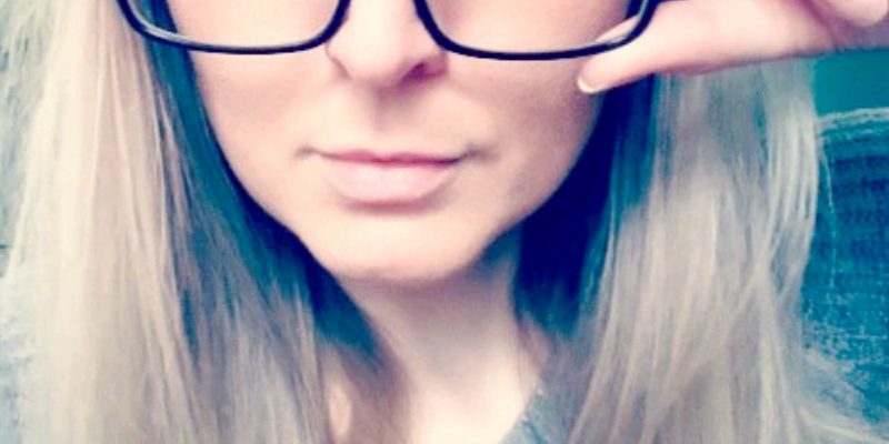 Shelley wearing black frames from EyeBuyDirect. 