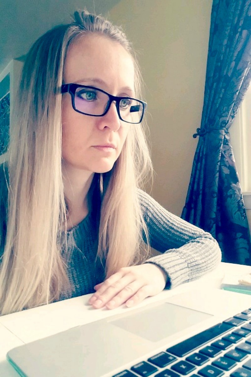 Shelley wearing glasses.