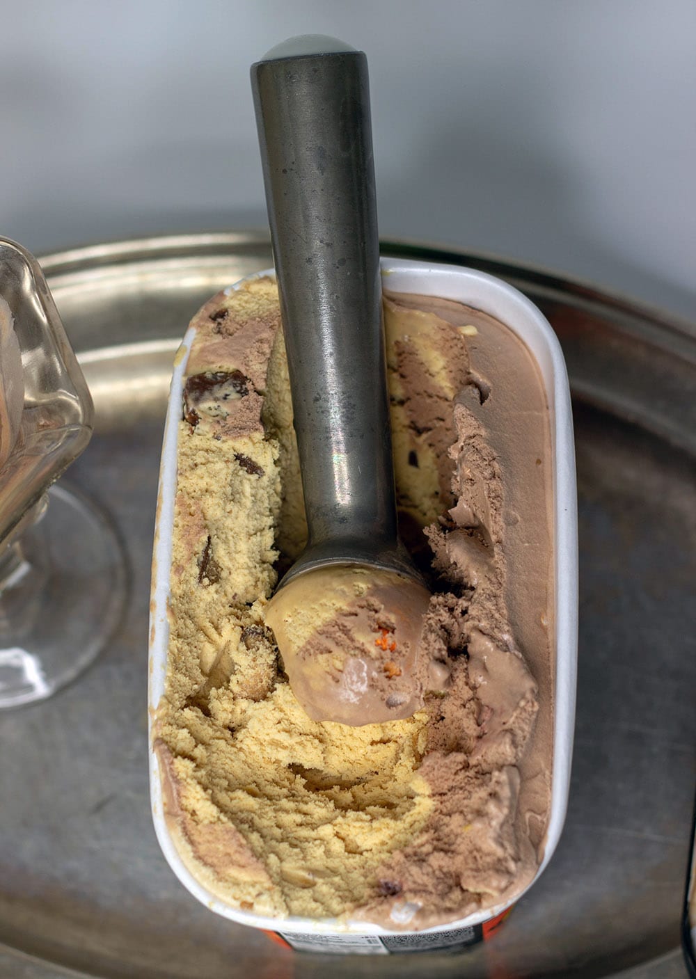 Breyer's 2-in-1 Reese's being scooped with an ice cream scoop.