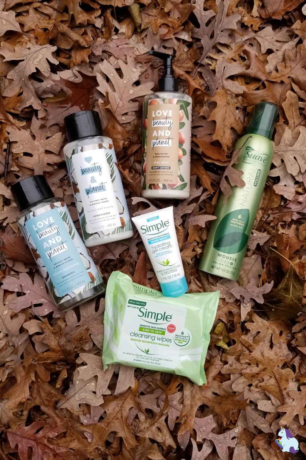 Beauty products laying on fall leaves.