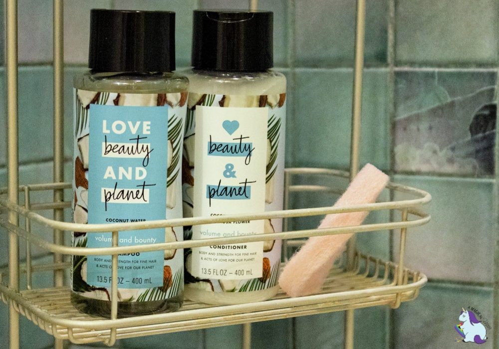 Love Beauty and Planet shampoo and conditioner in a shower.