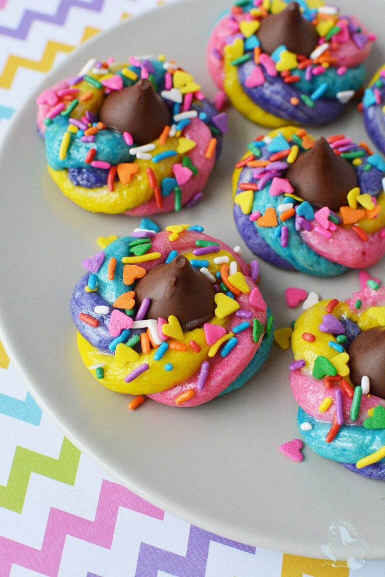 Sparkly and fun unicorn poop cookies on a plate
