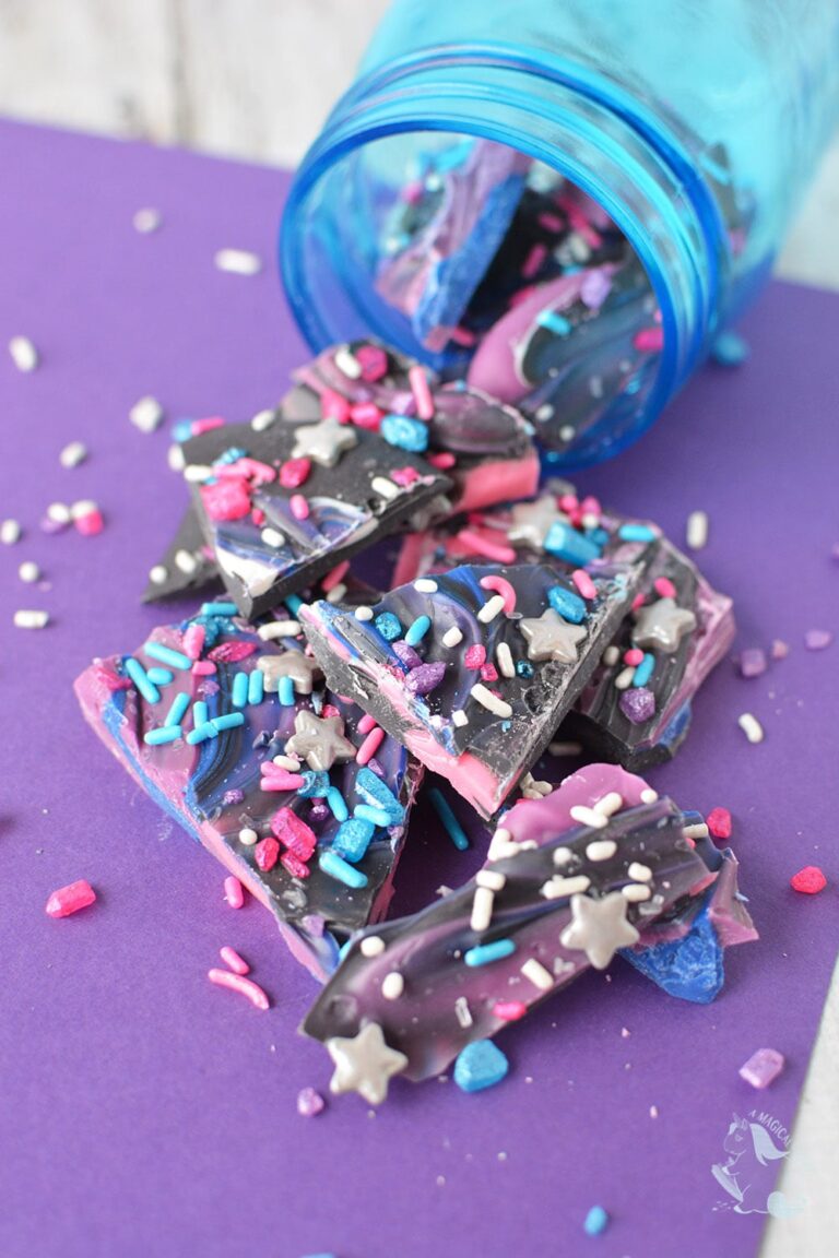 Galaxy bark spilled out of a blue mason jar.