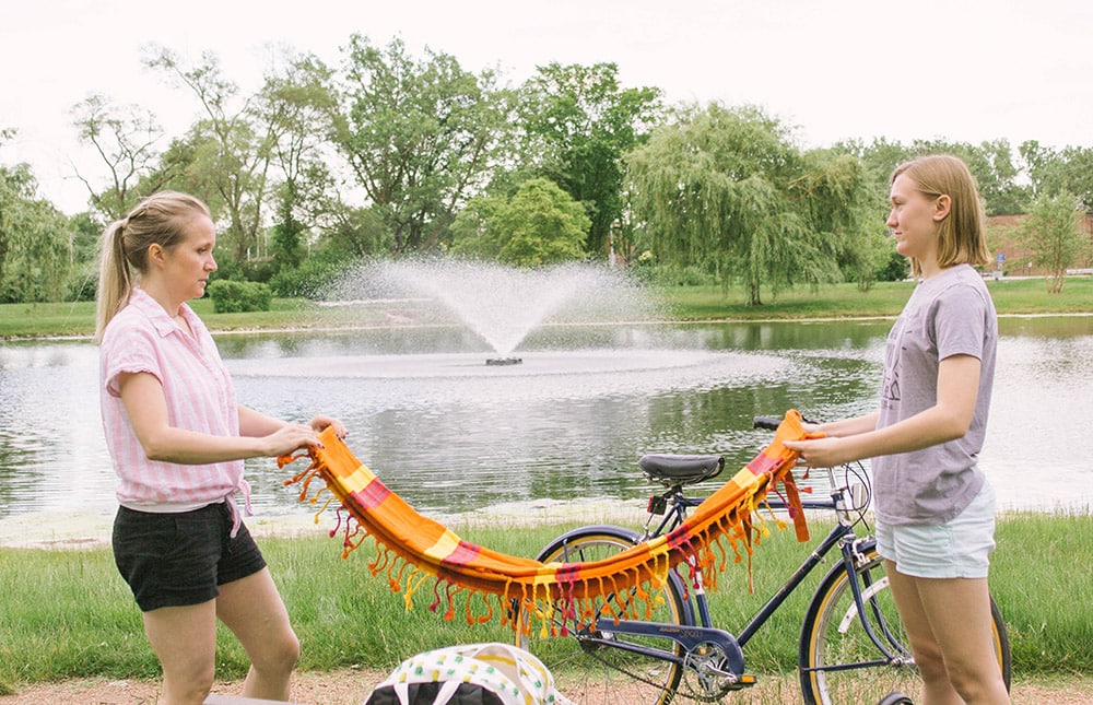 Shelley and Chesney getting the picnic blanket ready.