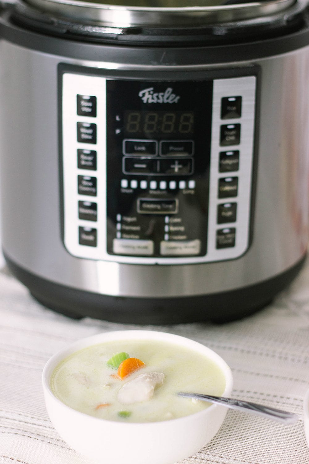 Fissler Souspreme Multi Pot with a bowl of soup.
