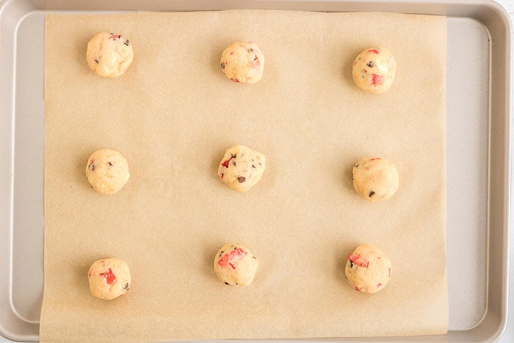 Dough balls on baking sheet.