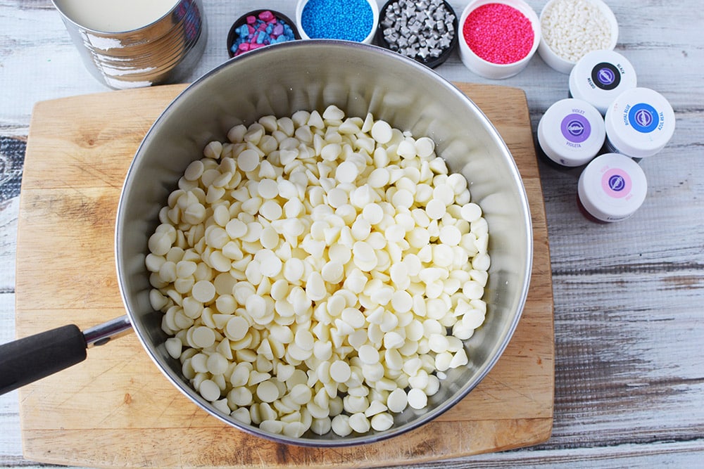 White chocolate chips in a sauce pan.