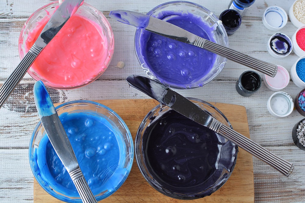 Colored bowls of fudge.