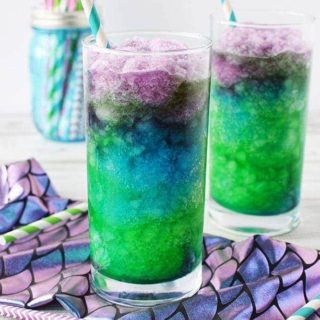 Mermaid drinks in glasses with straws