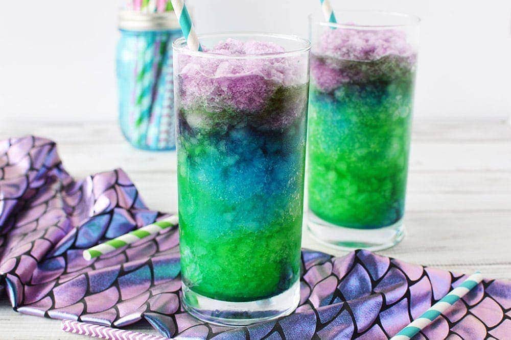 Mermaid drinks in glasses with straws.