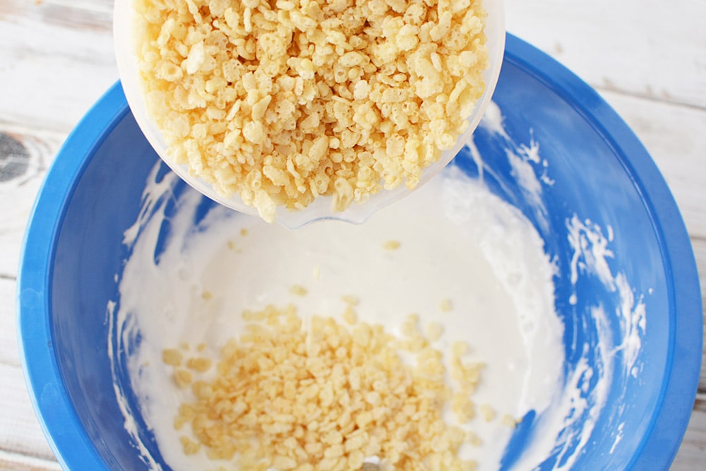 Rice Krispies going into marshmallows.