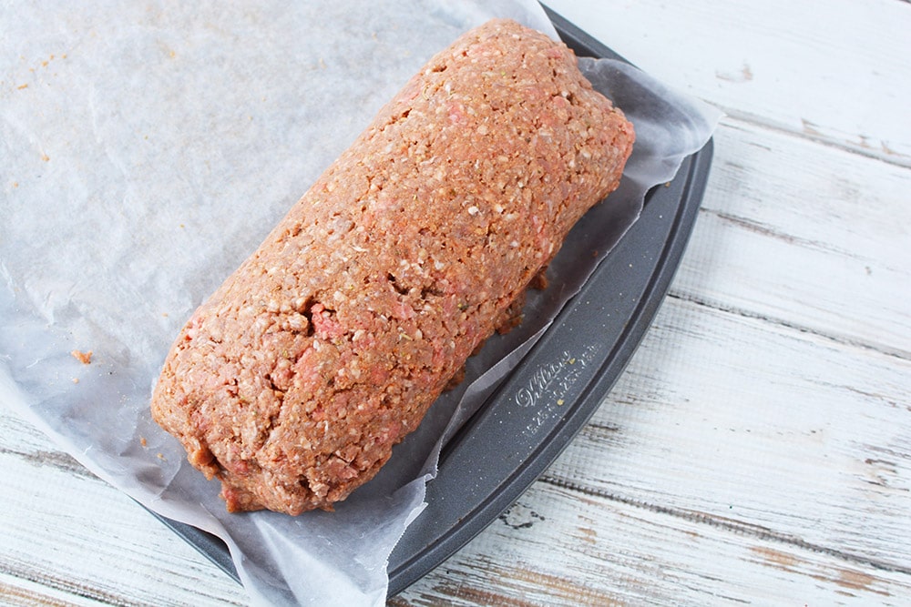 Rolled up meatloaf stuffed with cheese.