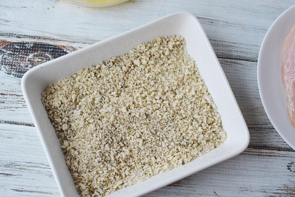 Bread crumbs and seasonings in a bowl.
