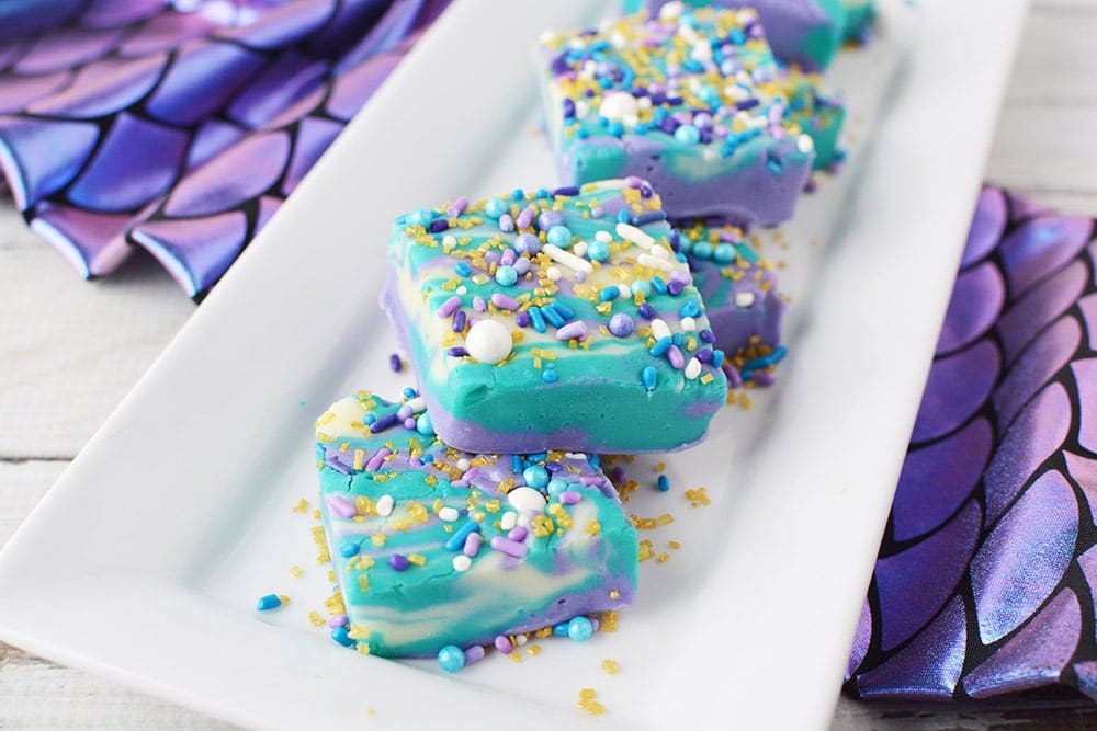 Mermaid candy sliced on a plate.