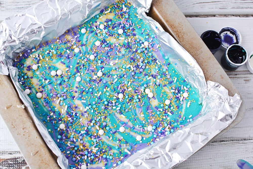 Mermaid fudge in pan with sprinkles.