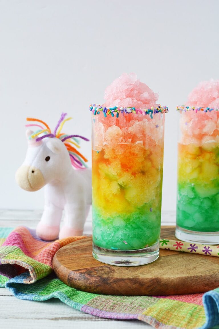 Unicorn slush in rainbow layers in glass