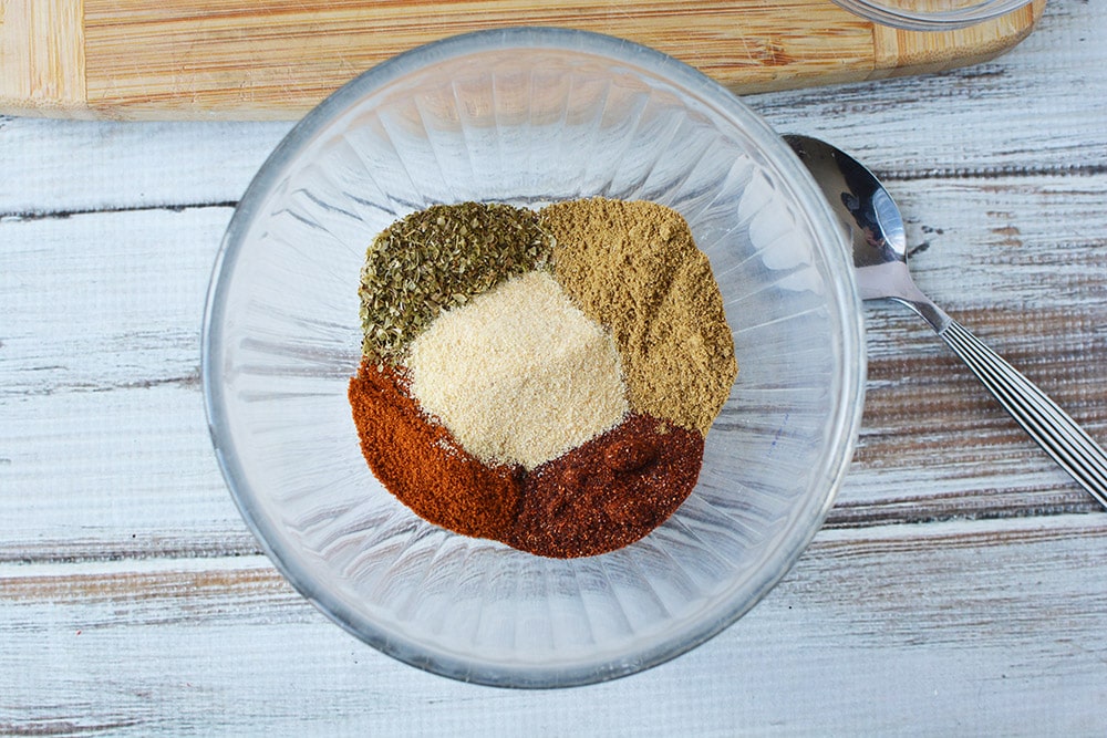 Bowl with all the spices for homemade taco mix.