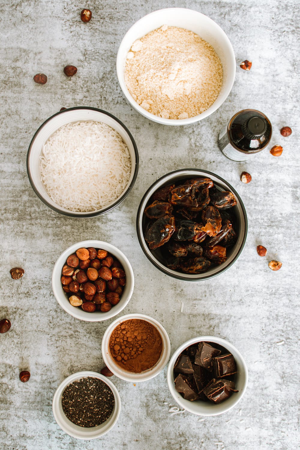 Ingredients for date balls in bowls.