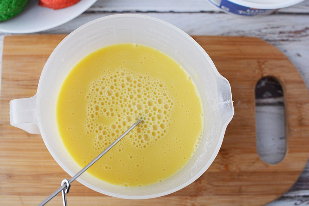 Vanilla pudding after whisking in bowl.