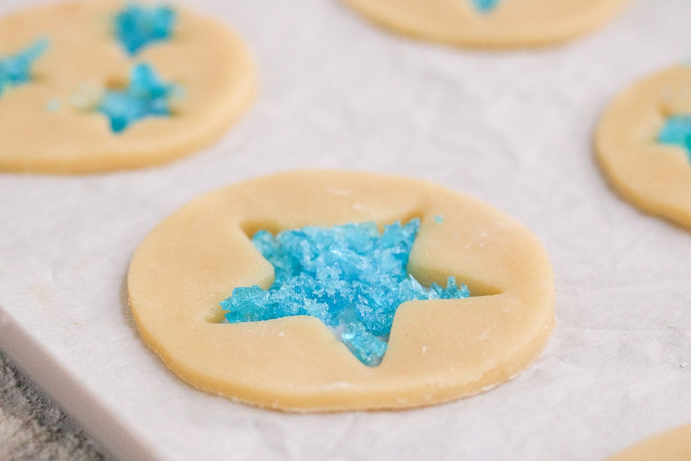 Crushed Jolly Rancher candies in the middle of cookies. 