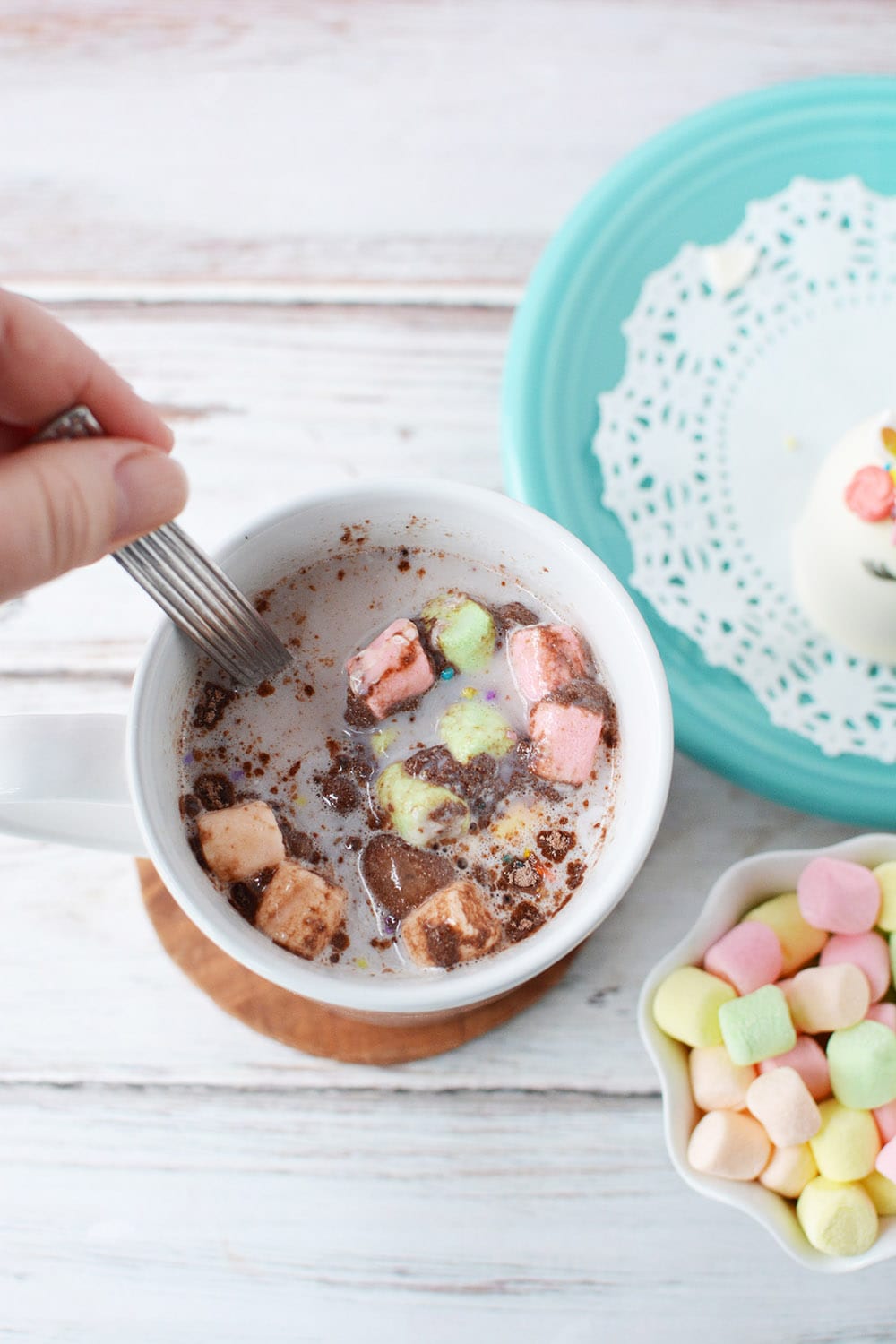 Stirring unicorn hot chocolate after bomb dissolved.