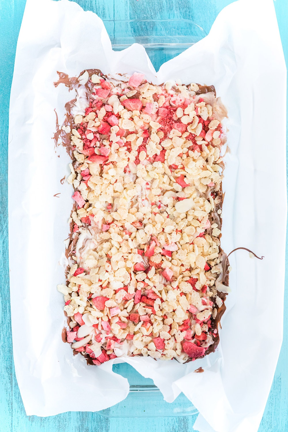 Layers of candy in a pan.