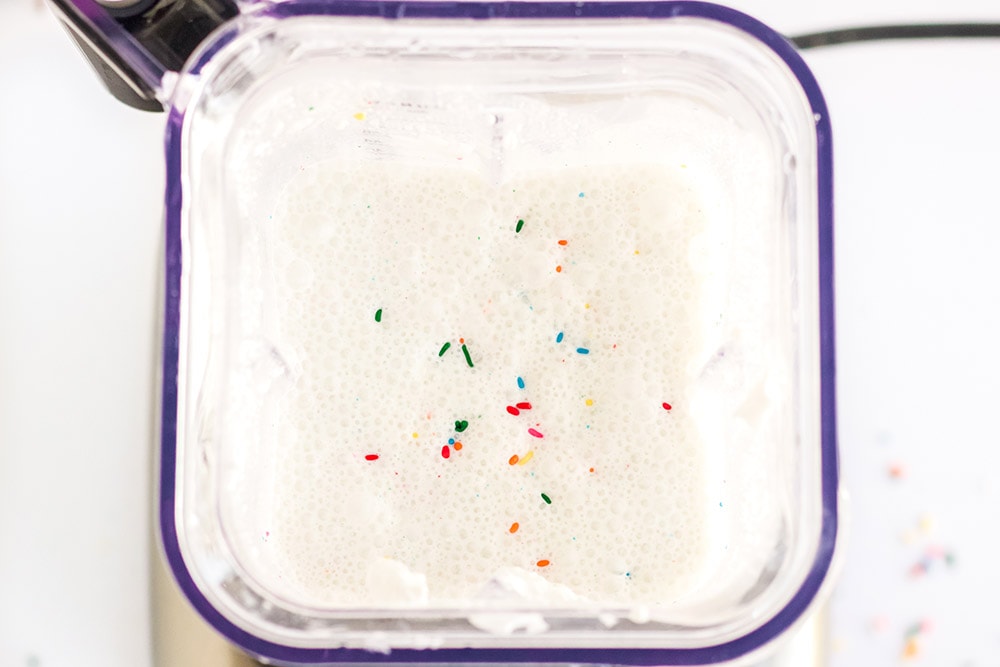 Cake mix pops batter in a blender.