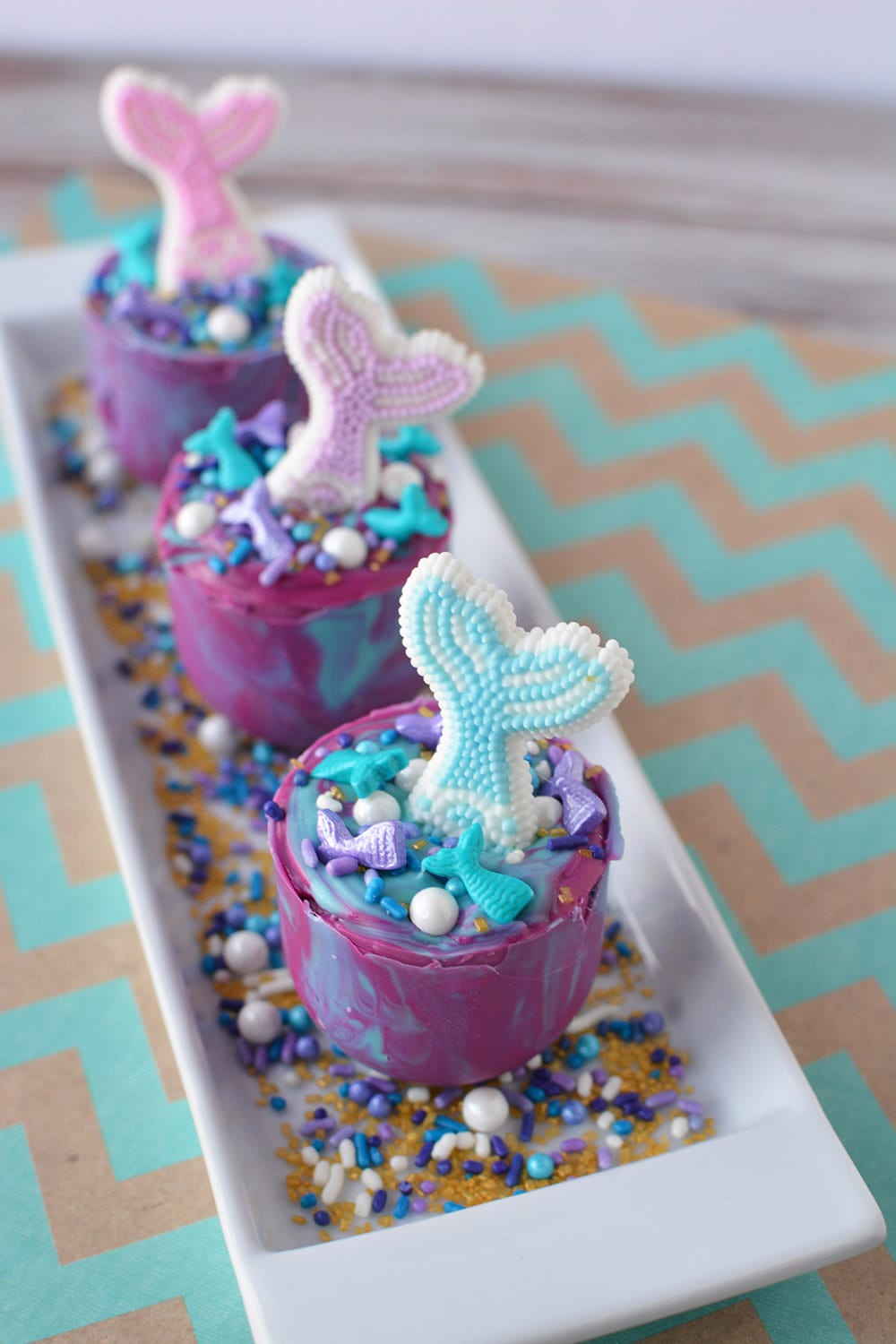 Three mermaid tail hot cocoa melts.