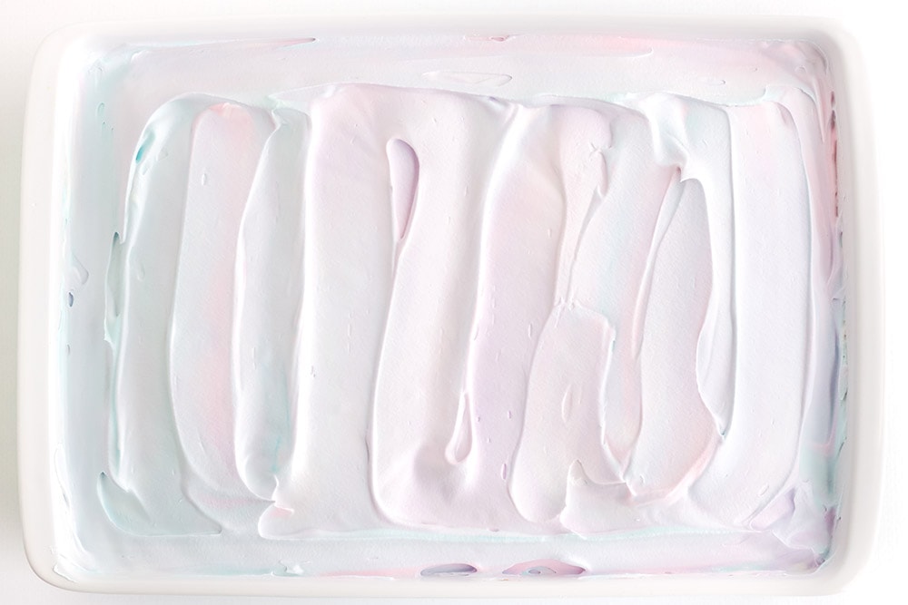 White frosting on a cake.