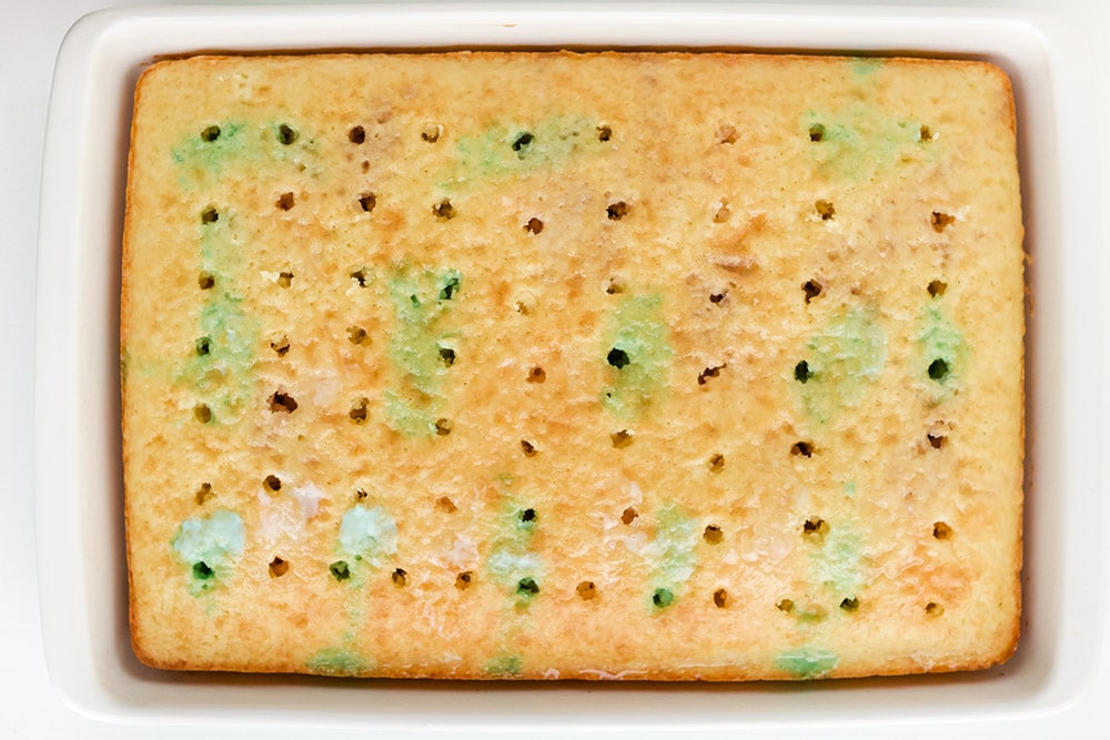 Jello in holes of a poke cake.
