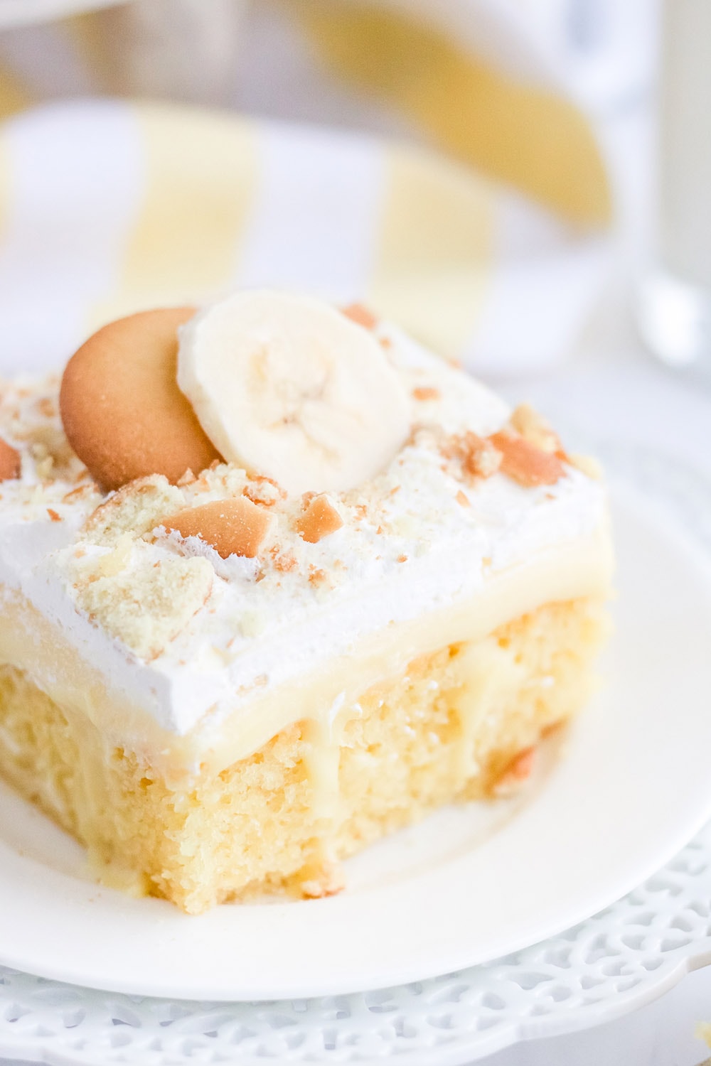 Banana cake with pudding topped with whipped cream and nilla wafers.