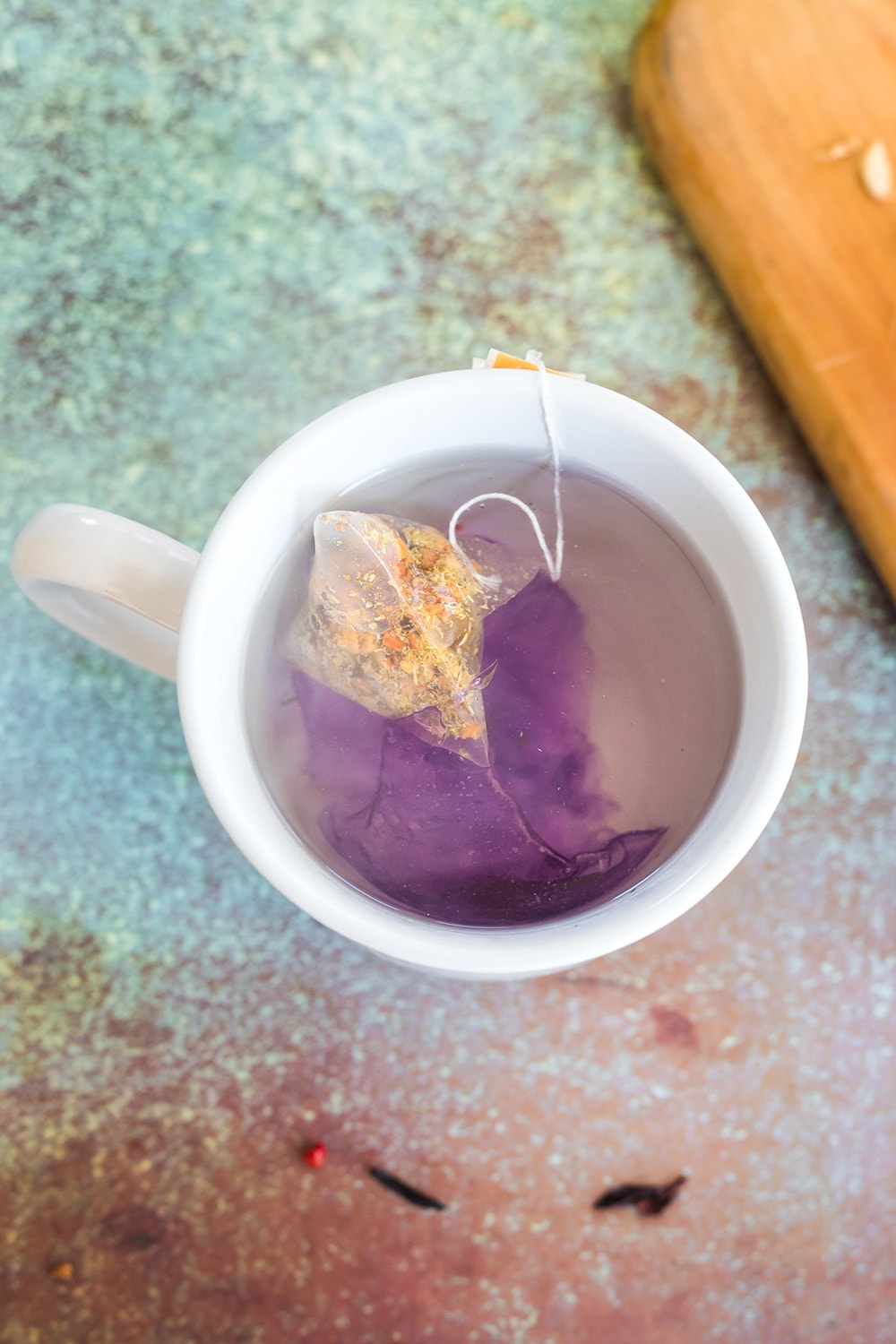 Mug with hot water and tea bag.