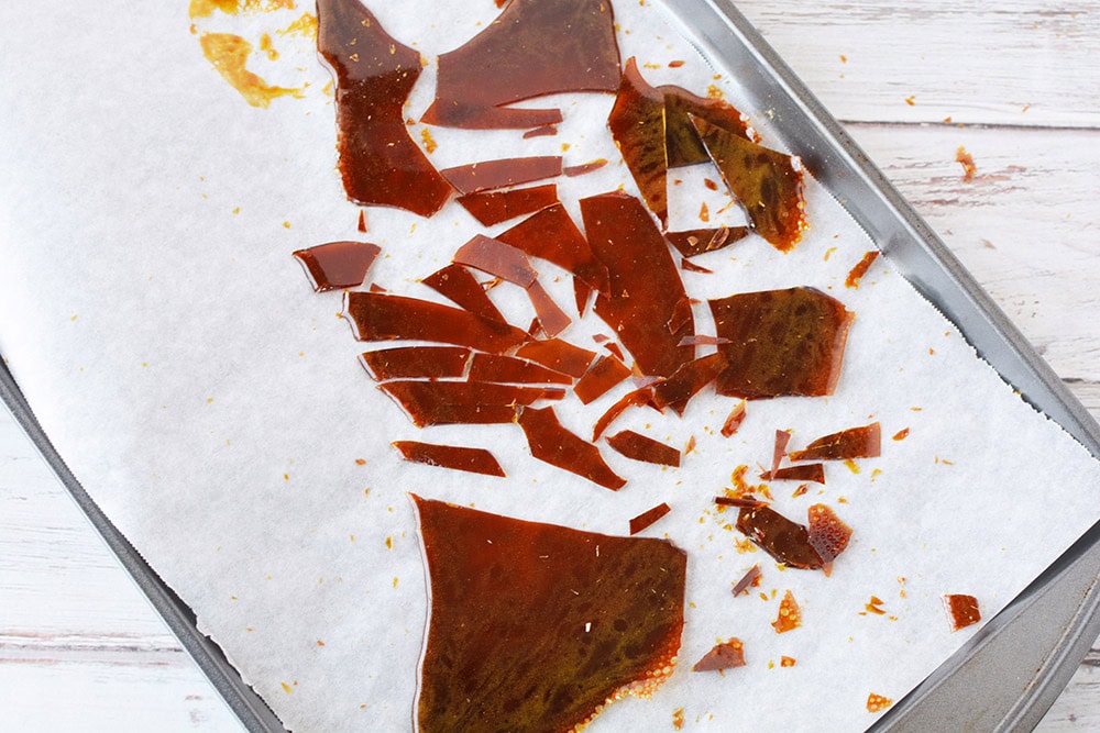 Pieces of heated up sugar on a baking sheet.