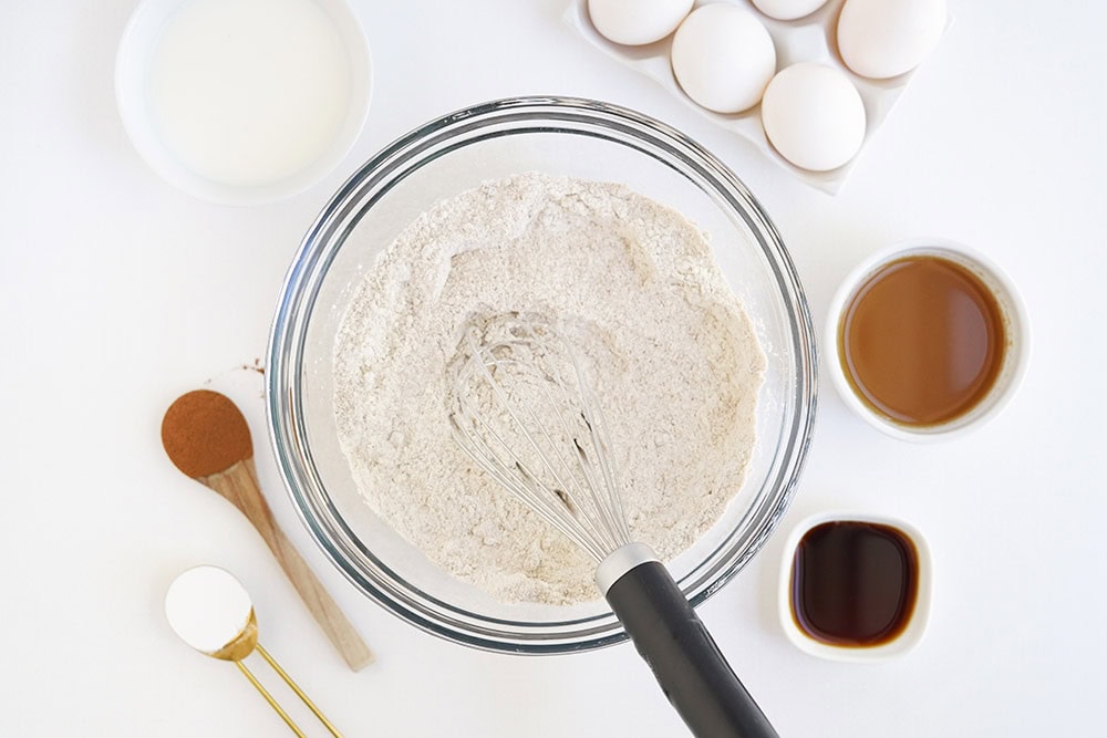 Mixing dry ingredients in a bowl.