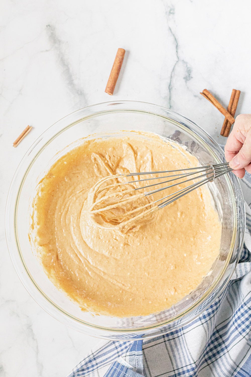 Batter for pumpkin hot cakes in a mixing bowl.