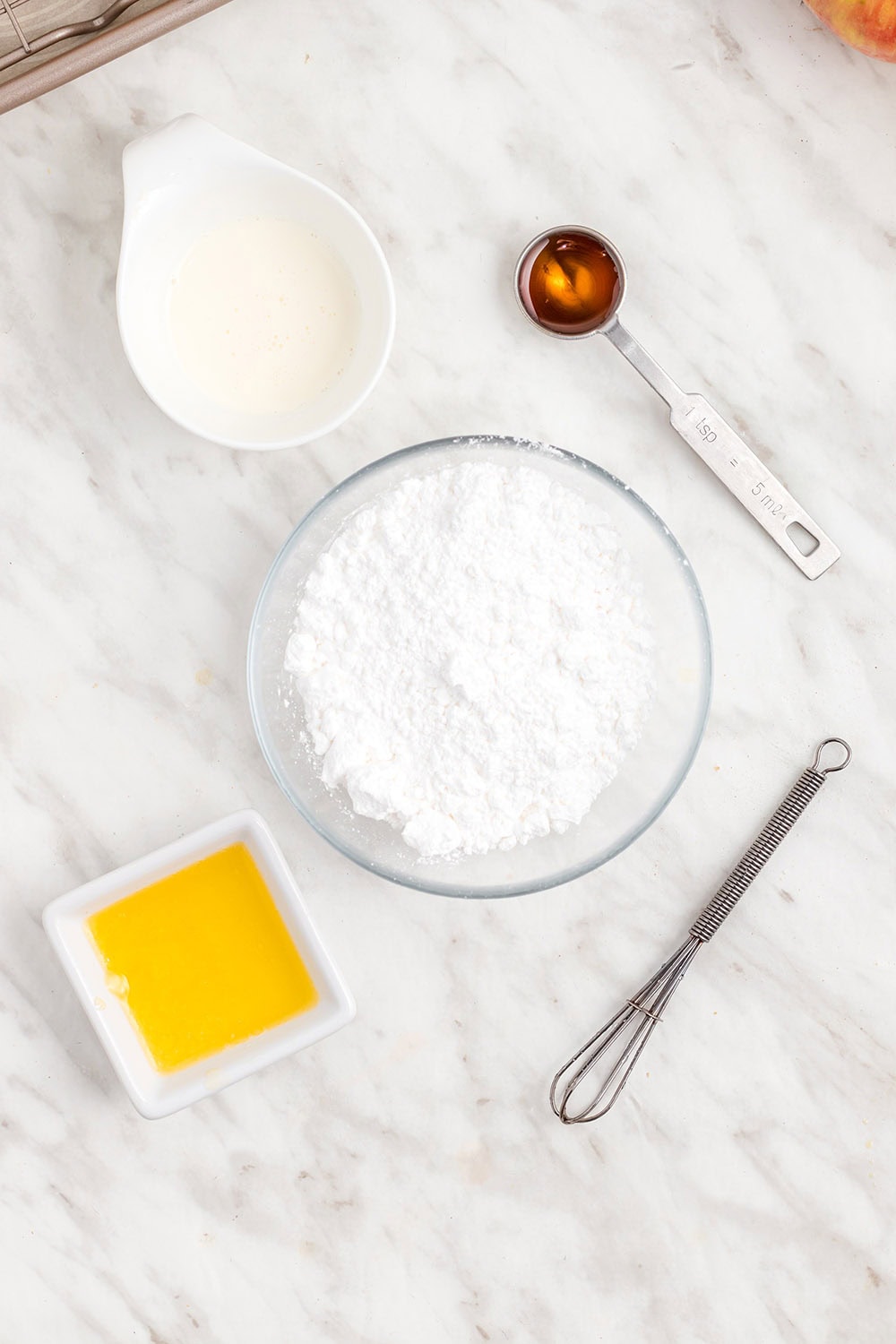 Powdered sugar, vanilla, butter, and cream.