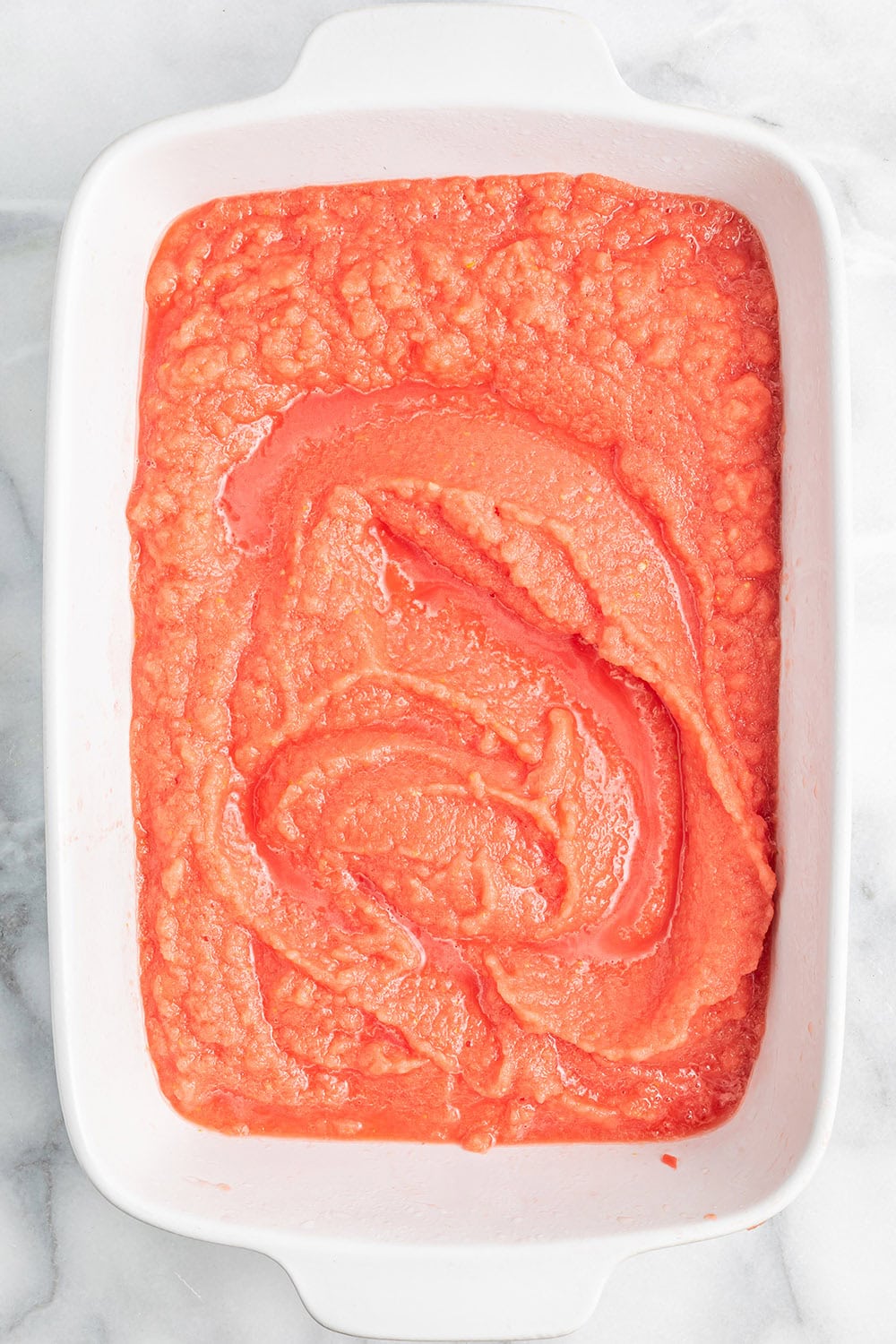 Blended watermelon in a white dish.