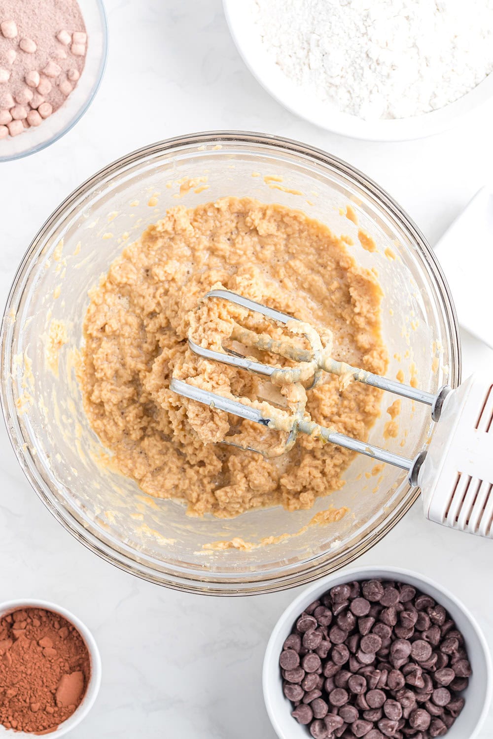 Batter in a bowl with a mixer.