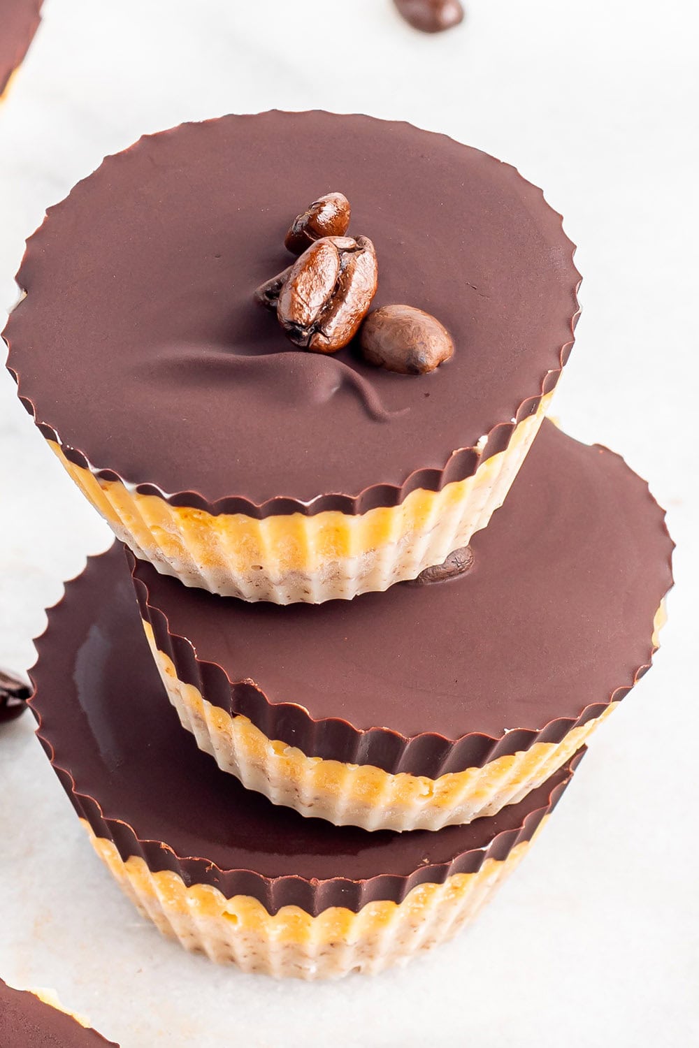 Stacked chocolate pumpkin butter candy cups.